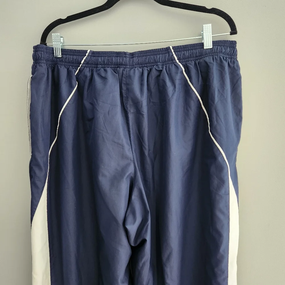 Men's Blue Under Amour Loose Athletic Pants with White Side Stripe and Zipper